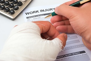 An injury victim in Olympia, WA filling his claim form.
