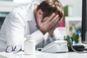 Physician having problem because of a medical error made by his team.