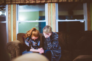 A family crying over the wrongful death of their father in Seattle.