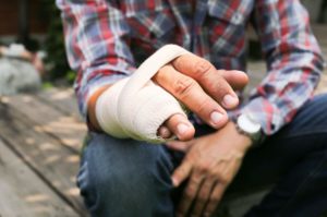 An injured man who will seek assistance from a proven attorney for personal injury in Monroe.